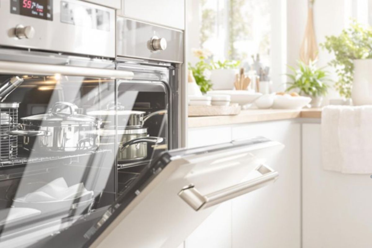 A modern white kitchen featuring an oven and dishwasher, ideal for showcasing appliance repair services.